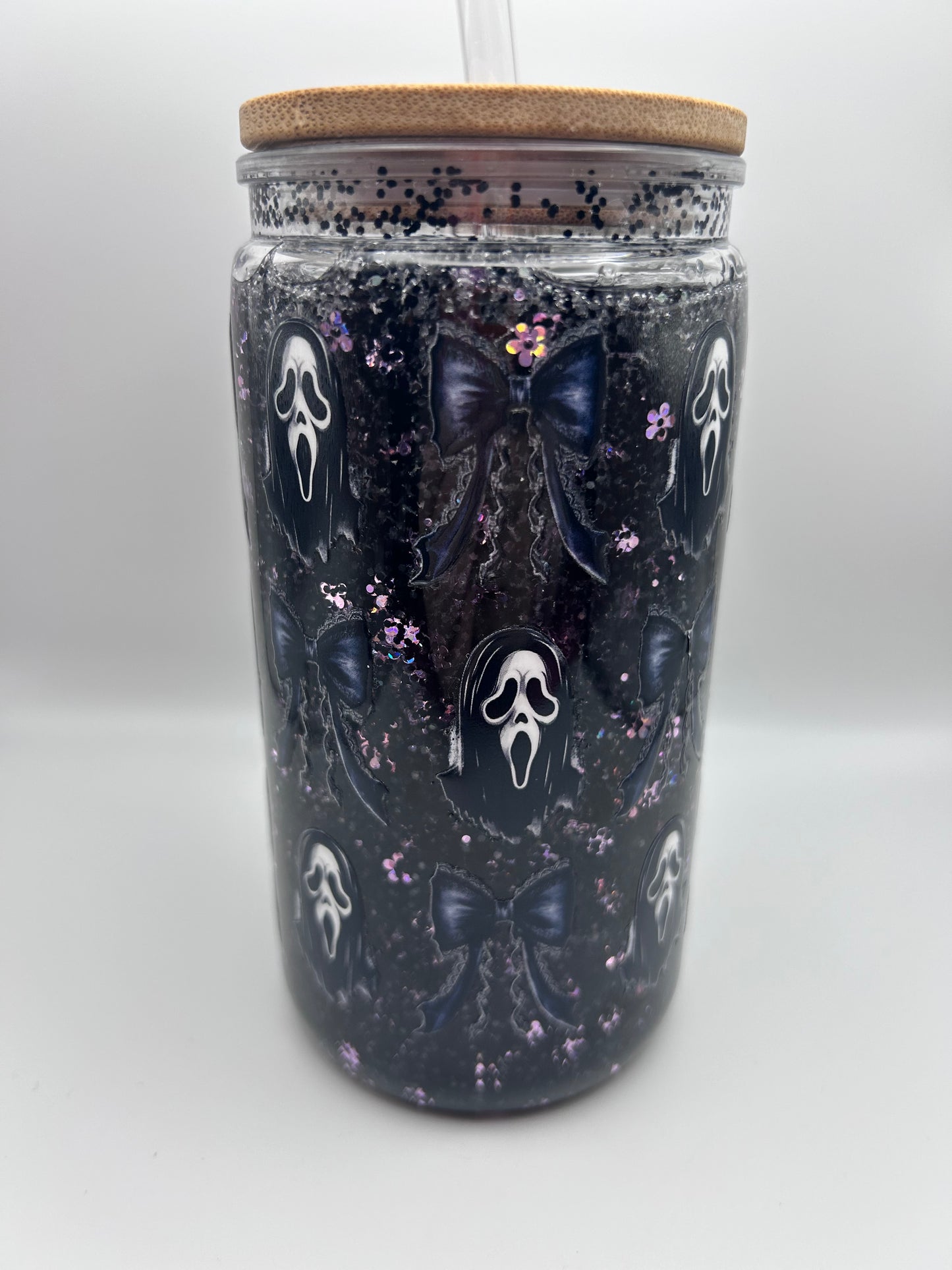 Ghost, face  16 oz plastic fast flow snow-globe tumbler.