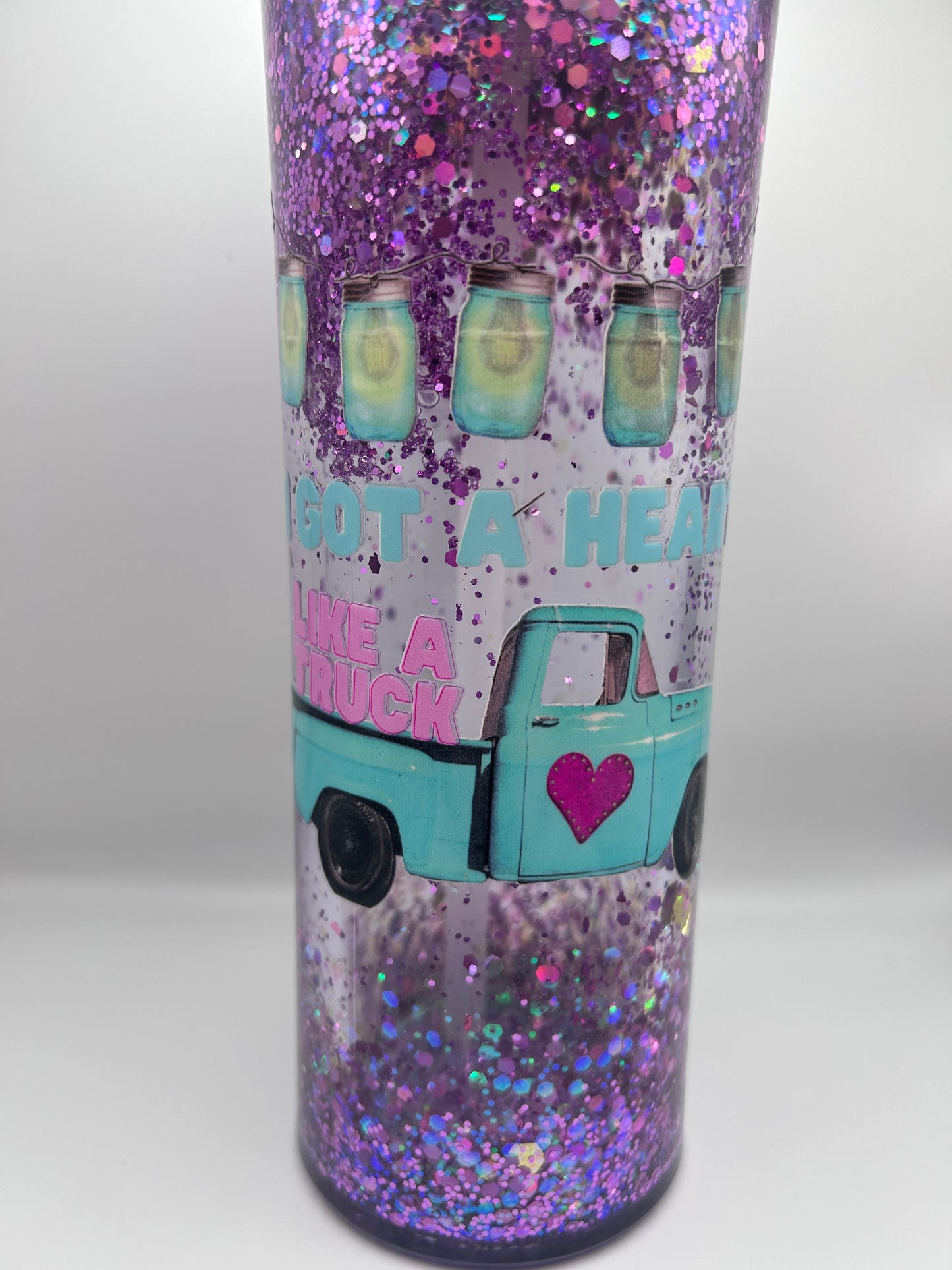 I got a heart like a truck  24 oz slow flow snowglobe tumbler.