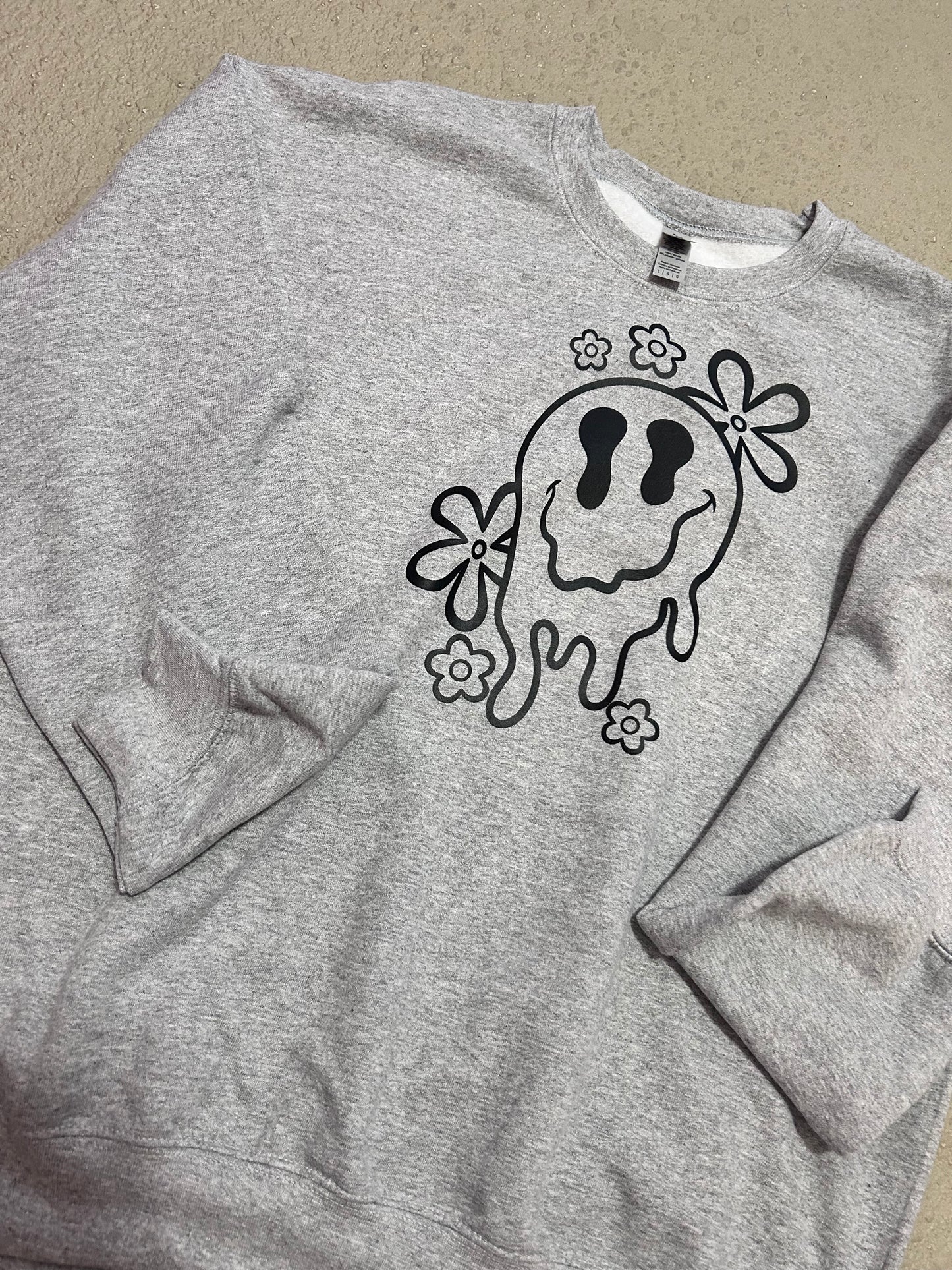 Drippy smiley face crewneck