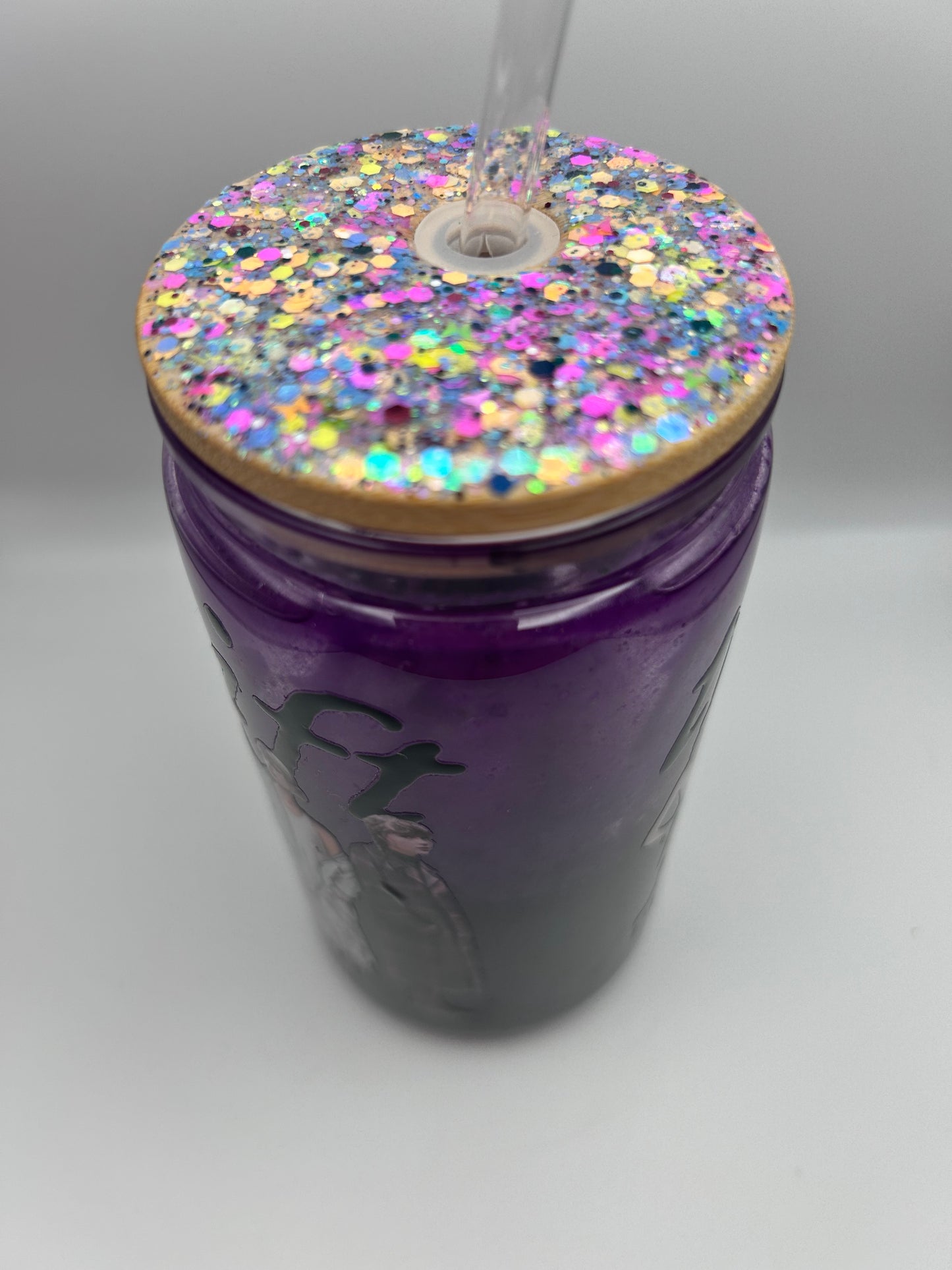 swifty  16 oz plastic medium flow snow-globe tumbler. With bling lid.