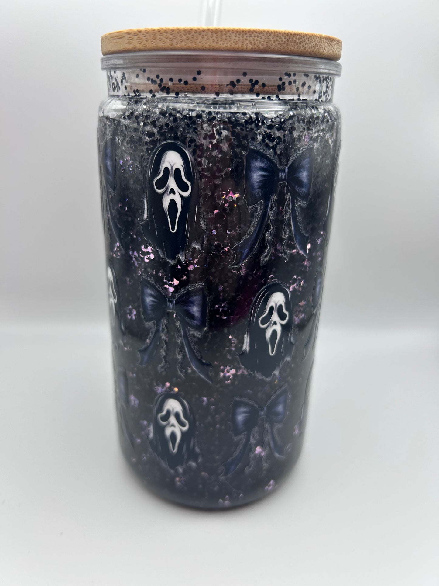 Ghost, face  16 oz plastic fast flow snow-globe tumbler.