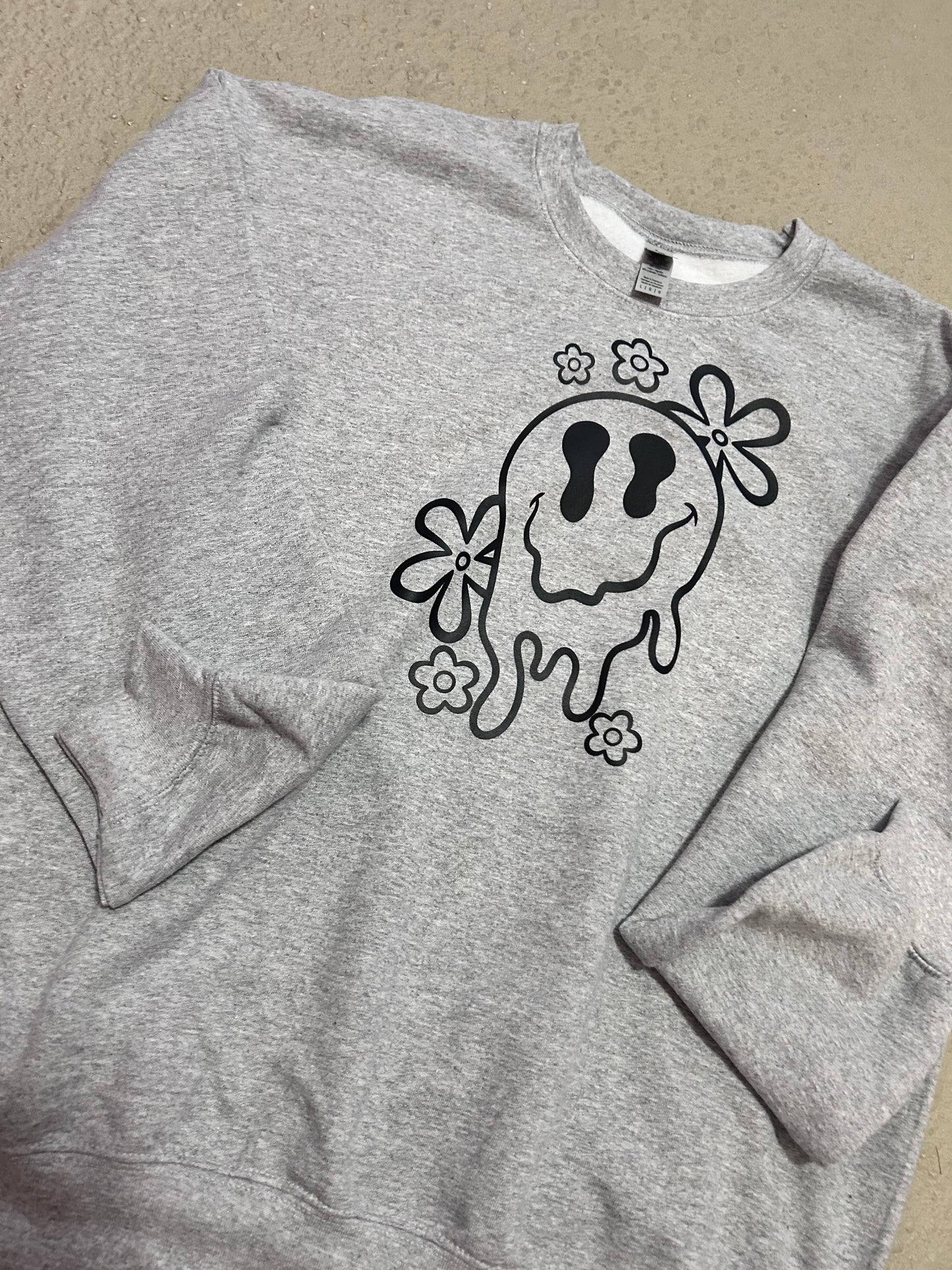 Drippy smiley face crewneck