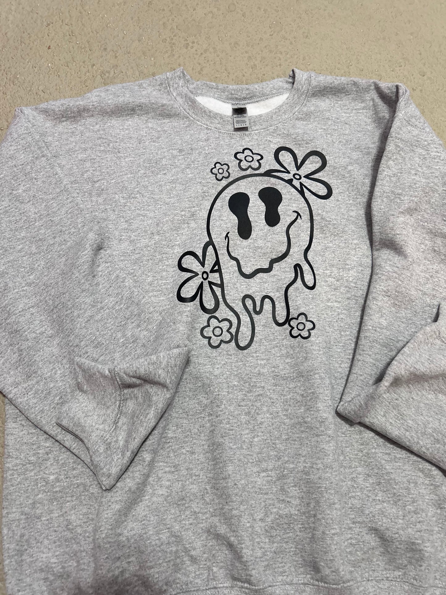 Drippy smiley face crewneck