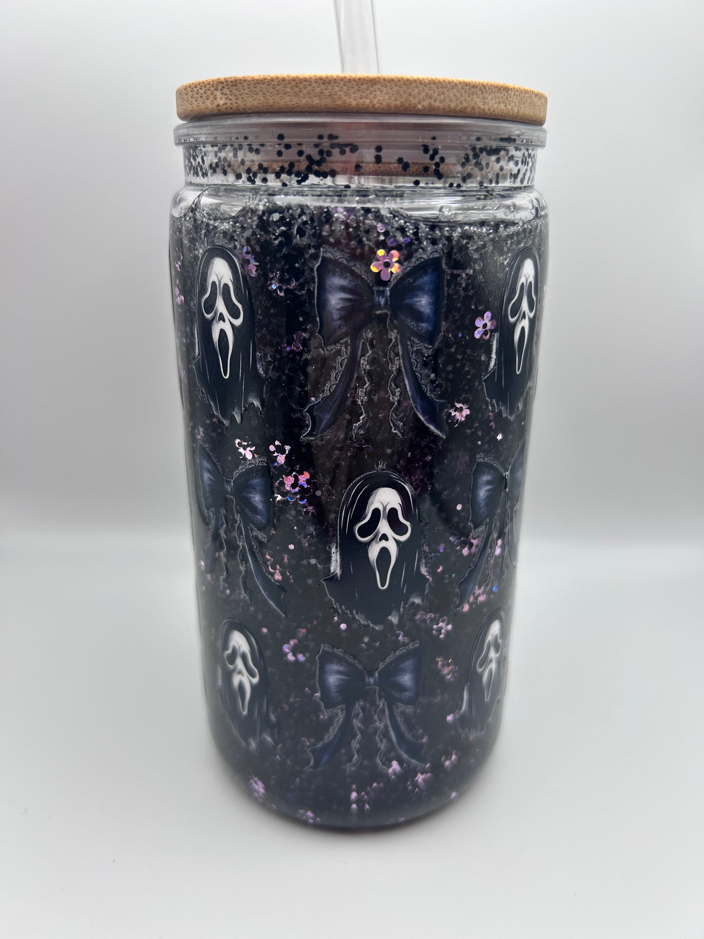 Ghost, face  16 oz plastic fast flow snow-globe tumbler.