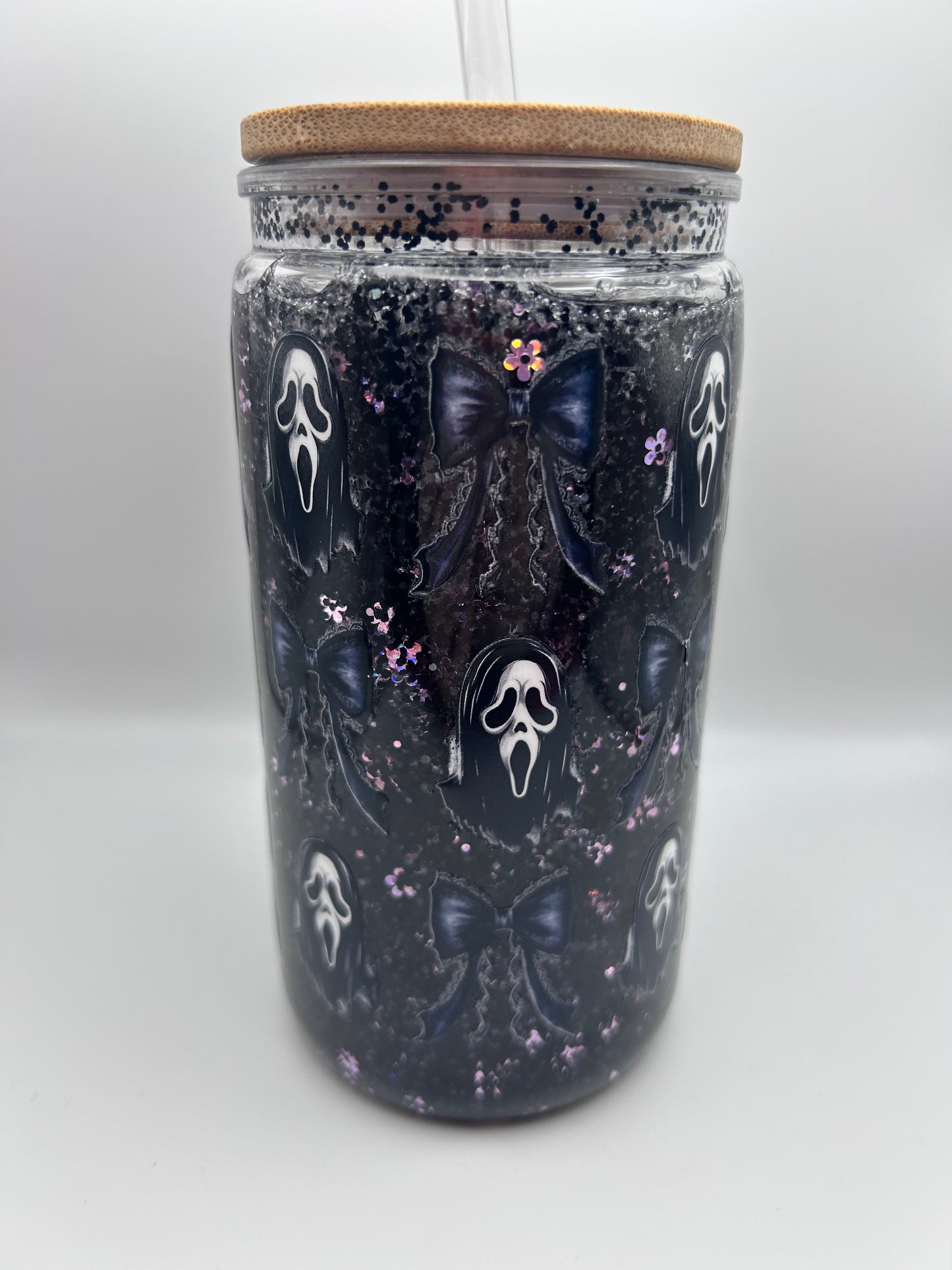 Ghost, face  16 oz plastic fast flow snow-globe tumbler.