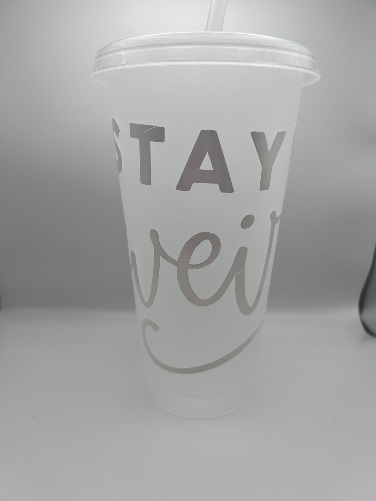 Stay weird white 24 oz cold cup with lid and straw.