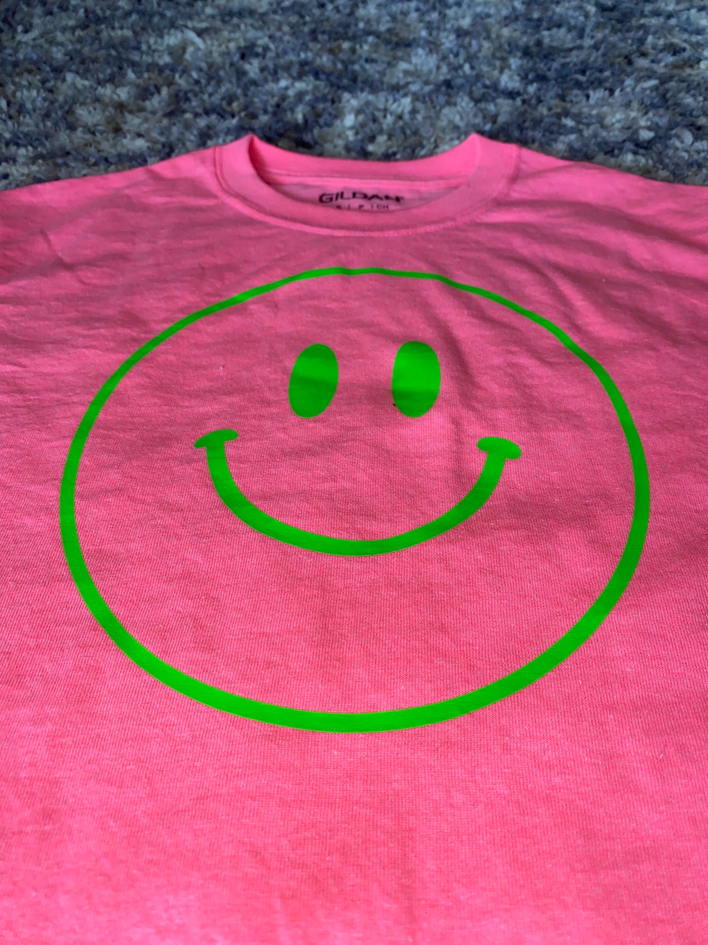 Smiley face t-shirt message for different T-shirt colors